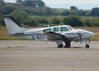 G-BZIT @ EGFH - Visiting Beech Baron operated by Propellerhead Aviation. Previously registered HB-GBS.  - by Roger Winser