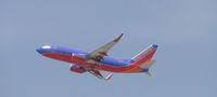 N431WN @ ONT - Wheels up, lifting off from runway 26R heading westbound - by Helicopterfriend