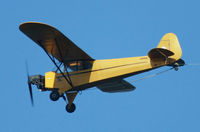N40936 - Hard to believe, but this 70-year-old airplane is still hard at work towing banners, as seen over Point Pleasant Beach, NJ. - by Daniel L. Berek