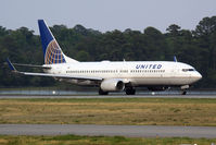 N17229 @ ORF - United Airlines (Continental Airlines) N17229 (FLT COA800) on takeoff roll on RWY 23 en route to Newark Liberty Int'l (KEWR). This flight was diverted to Norfolk and gated for nearly 2-1/2 hrs before to continuing to Newark.