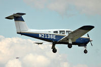 N2136E @ EGSX - 1978 Piper PA-28RT-201, c/n: 28R-7918002 at North Weald - by Terry Fletcher