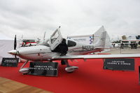 N427CD @ LFPB - on display at SIAE 2011 - by B777juju