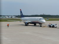 N138HQ @ ILM - On push back with what appears to be a cessna in the backround