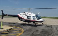 N56BH @ KAXN - Bell 206B JetRanger on the ramp.