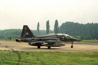K-4003 @ EHTW - NF-5B trainer of 313 squadron of the Royal Netherlands Air Force taxying onto the runway of Twente air base for a blind flying sortie. - by Henk van Capelle
