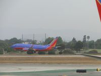 N353SW @ LAX - Ready to touchdown down on runway 24R - by Helicopterfriend
