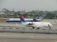 N416SW @ LAX - Waiting to take off on runway 24L behind United Express N755SK - by Helicopterfriend
