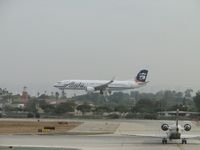 N557AS @ LAX - On final for landing on runway 24R - by Helicopterfriend