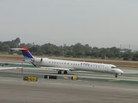 N810SK @ LAX - Taxiing to runway 24L - by Helicopterfriend