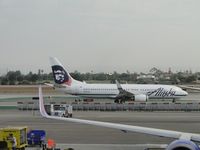 N583AS @ LAX - Taxiing onto runway 24L for take off - by Helicopterfriend