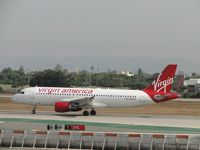 N639VA @ LAX - Taking off on runway 24L - by Helicopterfriend