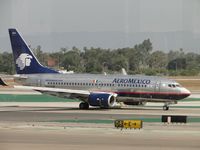 N904AM @ LAX - Taxiing to runway 24L - by Helicopterfriend