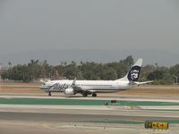 N513AS @ LAX - Dropped off passengers, loaded with more and is now departing westbound on runway 24L - by Helicopterfriend