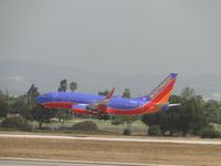 N487WN @ LAX - Landing on runway 24R - by Helicopterfriend
