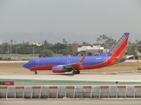 N796SW @ LAX - Starting take off roll westbound on runway 24L - by Helicopterfriend
