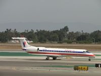 N846AE @ LAX - Taxiing to runway 24R - by Helicopterfriend