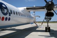 G-JEDJ @ EGJJ - Boarding De Havilland Canada DHC-8-402Q Dash 8 at Jersey Airport, Channel Islands in July 2011. - by Malcolm Clarke