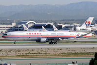 B-2174 @ KLAX - 25Left arrival - by Bob Grandolfo