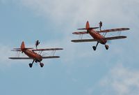 SE-BOG - Off airport. In formation with N707TJ to port. Wales National Airshow, Swansea Bay, Wales, UK. - by Roger Winser