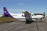 N857FE @ PAE - FedEx Caravan's come to Everett for painting - by Duncan Kirk