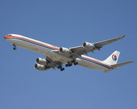 B-6052 @ KLAX - Short final rwy 24R. - by Philippe Bleus