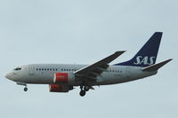 LN-RPS @ ESSA - SAS Boeing 737-600 about to land at Stockholm Arlanda airport, Sweden. - by Henk van Capelle