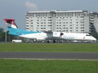 LX-LGD @ LFPG - Taxying to Terminal 2 as did the Fokker 27 and 50 which previously flew this registration