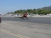 N131BZ @ SZP - 1961 Bucker JUNGMANN 131. Lycoming O-320 conversion, taxi off the active - by Doug Robertson