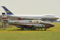 G-BXVZ @ EGMH - 1977 PZL-Mielec TS-11 Iskra, c/n: 3H-1625 at Kent International - with ex Southern Winds B747 , LV-AZF in the background - by Terry Fletcher