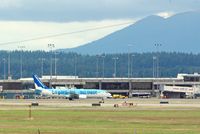 C-GWSZ @ YVR - showing its French side La Garantie Qui Tient