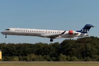 OY-KFH @ ELLX - on final RW06 - by Friedrich Becker