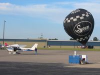 N7830T @ MRT - On the ramp at Marysville, Ohio w/N7527S in the background.