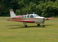 N4468S - Taxiing for takeoff at a private grass strip near Jackson, Mississippi - by R. Kelly Kyle