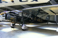 G-ABLS @ EGBT - immaculate DH Puss Moth in the main hangar at Turweston - by Chris Hall