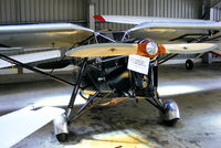 G-ABLS @ EGBT - immaculate DH Puss Moth in the main hangar at Turweston - by Chris Hall