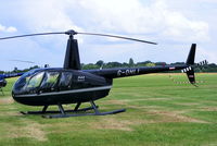 G-OHLI @ EGBT - being used for ferrying race fans to the British F1 Grand Prix at Silverstone - by Chris Hall
