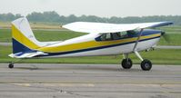 N2361G @ KAXN - A Cessna 182B Skylane converted to a taildragger? Never heard of that before..cool nonetheless! Taxiing for an engine run-up.