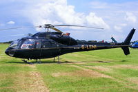 G-LENI @ EGBT - being used for ferrying race fans to the British F1 Grand Prix at Silverstone - by Chris Hall