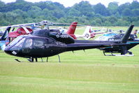 G-IDEB @ EGBT - being used for ferrying race fans to the British F1 Grand Prix at Silverstone - by Chris Hall