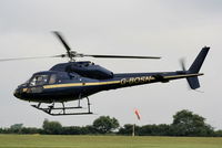 G-BOSN @ EGTB - being used for ferrying race fans to the British F1 Grand Prix at Silverstone - by Chris Hall