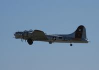N5017N @ KSTC - Aluminum Overcast, a Boeing B-17G Flying Fortress departing runway 31 in St. Cloud, MN.