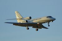 N223F @ KSAT - Landing 12R at sunset - by RWB