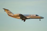N747KR @ KSAT - Landing 12R while the sun sets - by RWB
