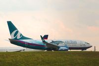 N354AT @ KATL - An AirTran B737-7BD in Georgia Aquarium Dolphin livery taxis into position for take off on runway 27R @ Atlanta's Hartsfield-Jackson International Airport. (an f-stop 5.6 photograph)
