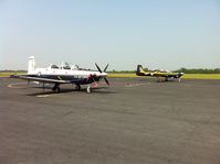 N613AL @ KGTR - N613AL with Columbus AFB T-6 at KGTR in June 2011 - by L. Leet