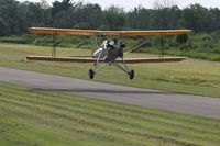 N26476 @ 42I - Departing the EAA fly-in at Zanesville, Ohio.