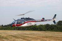 N51AE @ KEOK - just lifted and heading southeast. - by Glenn E. Chatfield