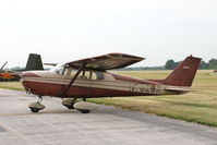N7628X @ KEOK - Parked on the ramp for breakfast. - by Glenn E. Chatfield
