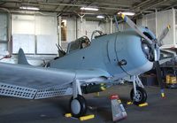 54654 - Douglas SBD-6 Dauntless (rebuilt with aft fuselage of 54654 and parts of other SBDs) in the Hangar of the USS Midway Museum, San Diego CA - by Ingo Warnecke