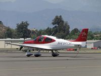 N414CP @ POC - Tied down and parked in transient parking - by Helicopterfriend